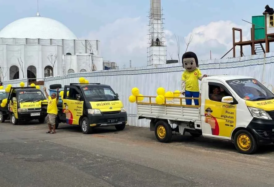 Maxim Gelar Kampanye Kargo, Bagikan Ratusan Paket Makanan ke Masyarakat